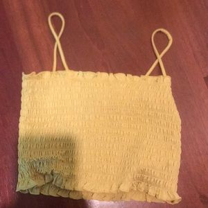 A yellow crop top :)